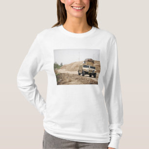 A Humvee conducts security T-Shirt