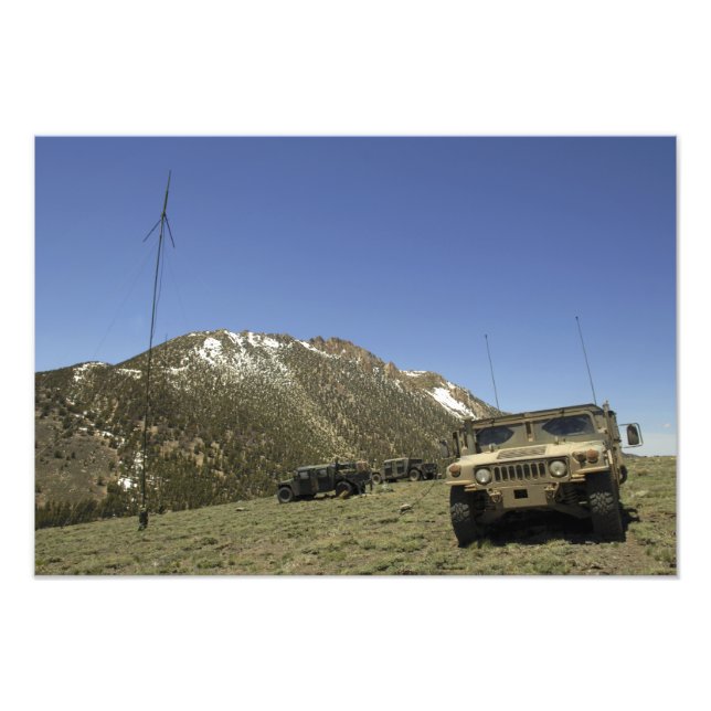 A Humvee is parked at the re-transmitting site Photo Print (Front)