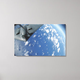 A KC-135 Stratotanker refuels a B-2 Spirit Canvas Print