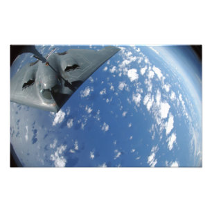 A KC-135 Stratotanker refuels a B-2 Spirit Photo Print