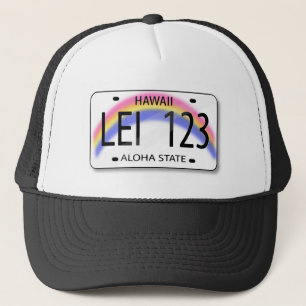 A licence plate with rainbow from Hawaii cap