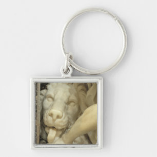 A Lion licking the foot of Daniel Key Ring