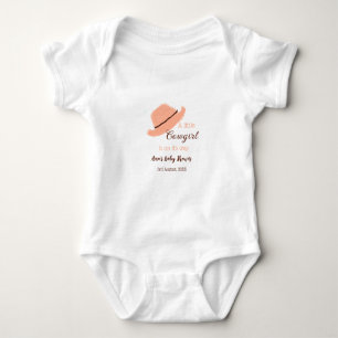 A little cowgirl is on it's way orange baby shower baby bodysuit