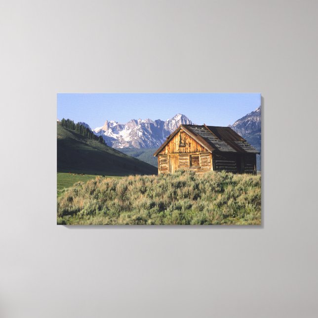 A log cabin and the Sawtooth Mountains in Canvas Print (Front)