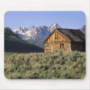 A log cabin and the Sawtooth Mountains in Mouse Pad