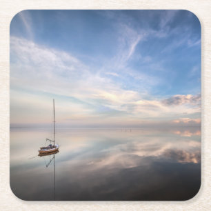 A Lone Sailboat On The Calm Waters Of Salton Square Paper Coaster