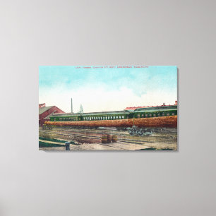 A Long Tree Log on Railroad Tracks Canvas Print