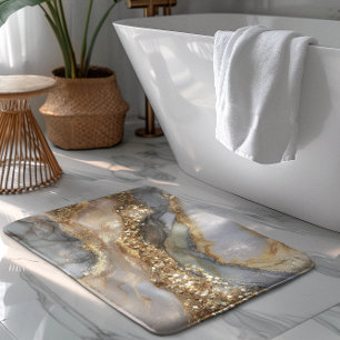 A luxurious gold and white marble background bath mat