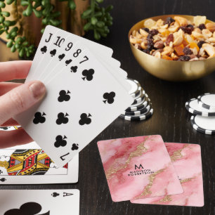 A luxurious pink marble background playing cards