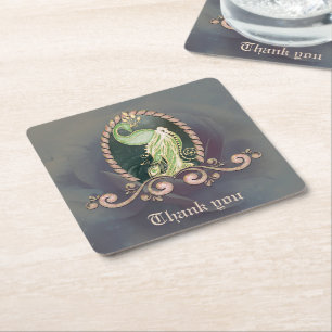 A majestic peacock in gold and green.  square paper coaster