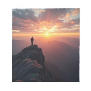 A majestic sunrise seen from the mountain peak Notepad
