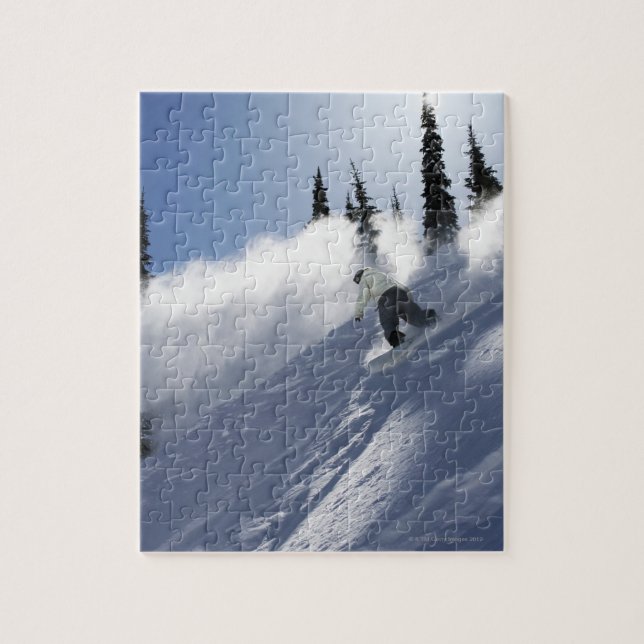 A male snowboarder ripping powder in Idaho. Jigsaw Puzzle (Vertical)