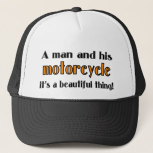 A man and his motorcycle trucker hat