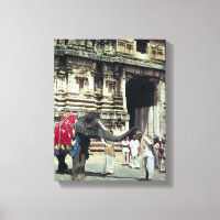 A man being blessed by an elephant