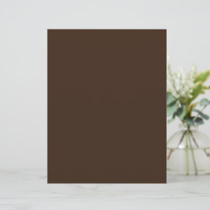 a man in a suit and tie standing in front of a bro custom letterhead