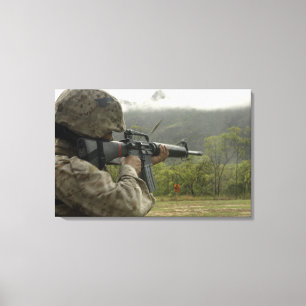 A Marine conducts drills Canvas Print