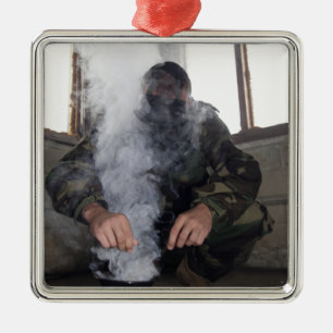 A marine fills the gas chamber with more CS gas Metal Tree Decoration