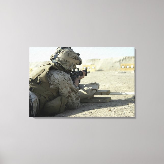 A Marine fires a M16A2 service rifle Canvas Print (Front)