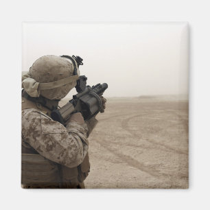 A Marine fires the M-32 Magnet
