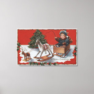 A Merry ChristmasKid in a Soap-Box Sled Canvas Print
