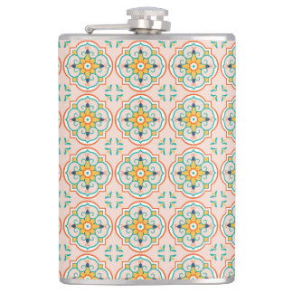 A metal flask with a colorful, symmetrical pattern