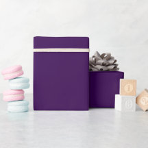A minimalist purple background with subtle