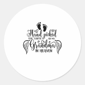 A moment in our arms a lifetime in our hearts classic round sticker