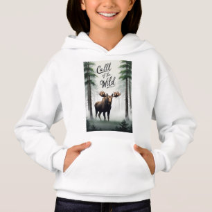 A moose standing in a misty forest