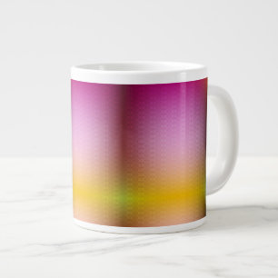 A mug with a gradient design in shades of pink