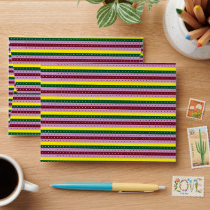 a multicolored striped background with dots envelope