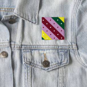 a multicolored striped pattern with dots 15 cm square badge