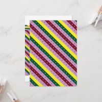 a multicolored striped pattern with dots