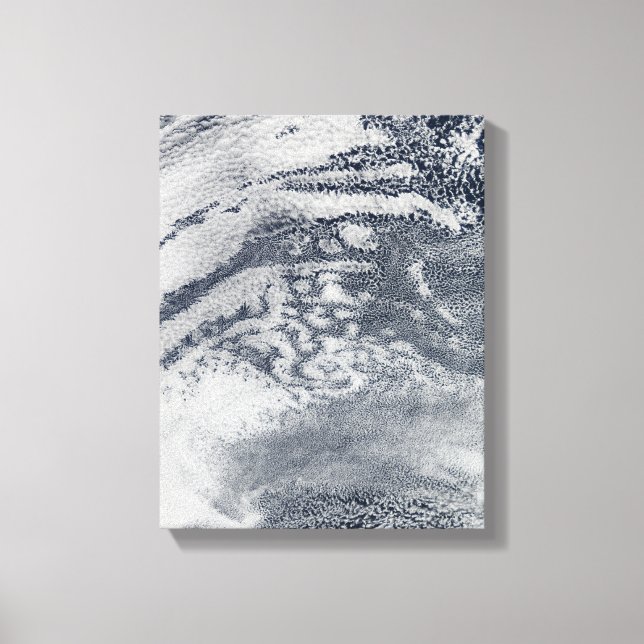 A network of clouds over the Pacific Ocean Canvas Print (Front)