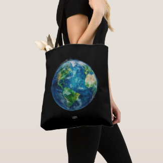 A painting of the earth in a space tote bag