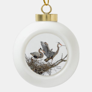 A pair of Great Blue Herons Ceramic Ball Christmas Ornament