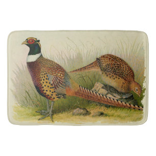 A pair of Ring necked pheasants in a grassy field Bath Mat