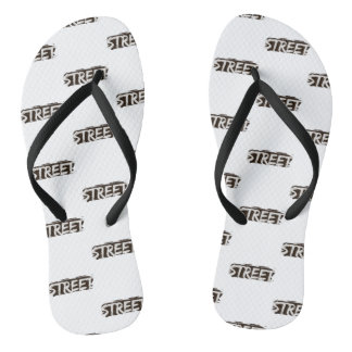 A pair of white Slipers Jandals