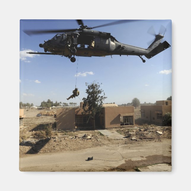 A pararescueman rappels from an HH-60 2 Magnet (Front)