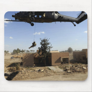 A pararescueman rappels from an HH-60 2 Mouse Pad