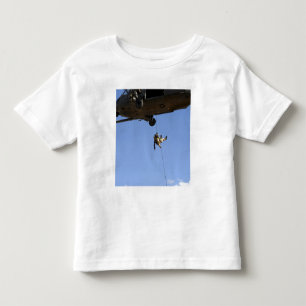 A pararescueman rappels from an HH-60 Toddler T-Shirt