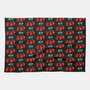 A Pattern Of Red Cherries on Stems Leaves on Black Tea Towel