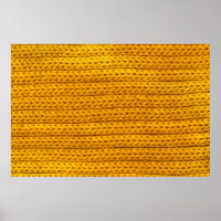 A pattern of yellow knitted fabric of yarn.