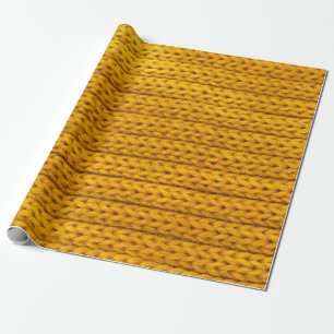 A pattern of yellow knitted fabric of yarn. wrapping paper
