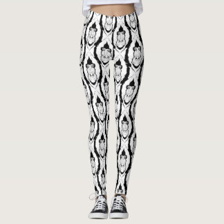 a pattern with a mandrill head leggings