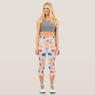 A person wears colourful leggings