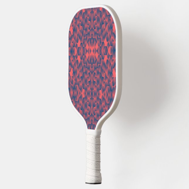 A pickleball paddle with a vibrant, geometric red  (Left)