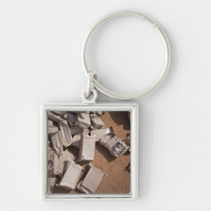 A pile of Meals Ready to Eat Key Ring