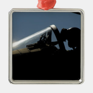 A pilot prepares for take-off metal tree decoration