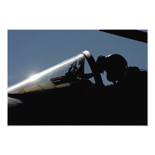 A pilot prepares for take-off photo print (Front)