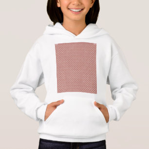 a pink and white background with a pattern